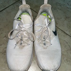 white nike running shoes